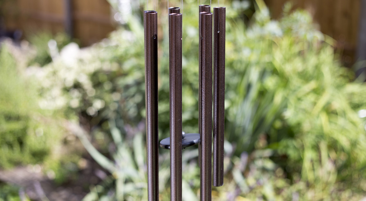zen wind chime glistening streams outdoor garden